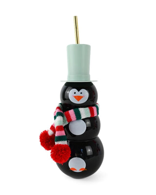 A penguin in a top hat and scarf holding a Packed Party Penguin Novelty Sipper.