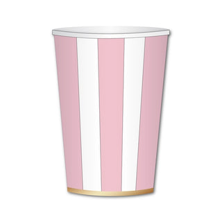 Introducing our Bonjour Fête Petal Pink Cabana Stripe Cups: high-quality cups made from eco-conscious materials, featuring vertical pink and white stripes with a thin gold band at the base.