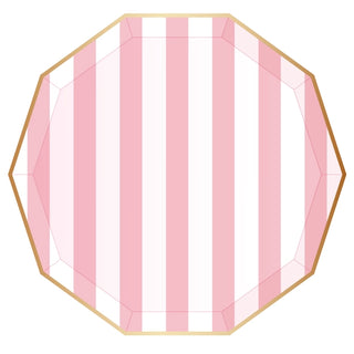 A stylized illustration of a Petal Pink Signature Cabana Stripe Plate with a faceted cut, featuring vertical stripes and an octagonal outline with a slightly brownish hue indicating a golden setting.