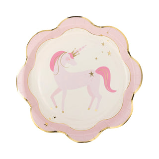 A **Pink Unicorn Ruffle Edge Plate** with a scalloped pink border featuring an illustration of a pink unicorn with a mane and tail, a gold horn, and star accents. Perfect for creating magical party vibes! **My Mind’s Eye** product.