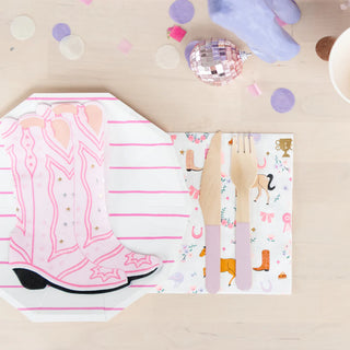 A pink cowgirl party set with confetti and Pony Tales Large Boot Napkins by Daydream Society.