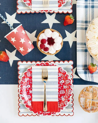 Celebrate the Fourth of July with a patriotic flair by setting a table with red, white and blue plates and napkins. Add some My Mind's Eye Red and Blue Star Paper Cups to complete the festive look.