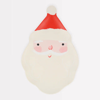 The Meri Meri Melamine Reusable Santa Plate features a minimalist Santa Claus face with a red hat and white beard, making it an ideal choice for Christmas festivities.