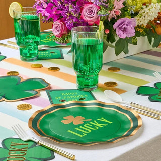 Celebrate St. Patrick's Day with a lucky table setting featuring Sophistiplate's Shenanigans Dinner Plates adorned with four leaf clovers.