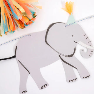 Add some flair to your Safari-themed party with this Meri Meri elephant party banner featuring pom poms and tassels.