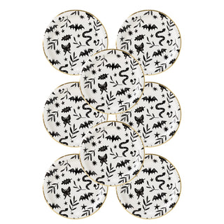 Eight My Mind’s Eye Spooky Icons Plates, adorned with gold rims and black Halloween-themed designs like bats, spiders, and stars in a staggered pattern—perfect for your next spooky celebration.