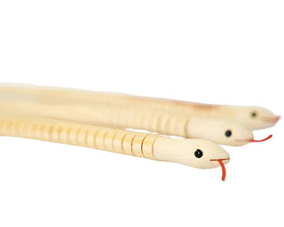 Three Snake Catcher Wooden Snakes by Pop! Party Supplies, with painted eyes and red tongues, positioned side by side on a white background, make perfect party favors or customizable decorations.