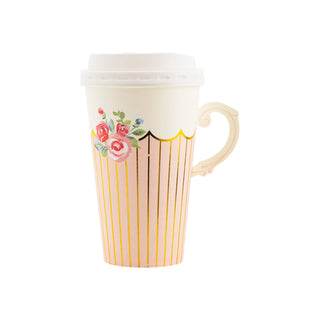 A beige ceramic mug with a lid, decorated with pink and green flowers and yellow vertical stripes, reminiscent of My Mind’s Eye Tea Party Handled Paper Cups.