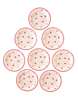 A set of Whimsy Santa Scattered Santa Paper Plates from My Mind's Eye in a pyramid shape with red and white paper plates.