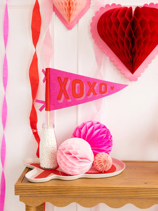 XOXO Felt PennantOur XOXO Felt Pennant is the perfect way to show your love! This bright and playful statement piece features bold red and pink felt, with a fun XOXO design that addsMy Mind’s Eye