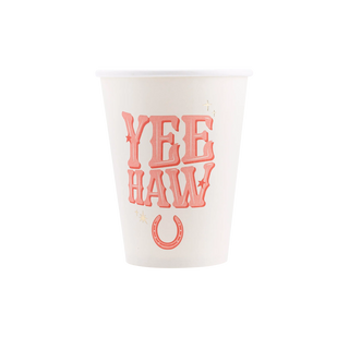 A "Yeehaw Paper Party Cup" by My Mind’s Eye, with the phrase "yeehaw" in red western-style lettering, decorated with stars and a horseshoe, set against a black background.