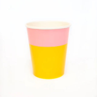 A Kailo Chic Yellow and Light Pink Color Block Paper Cup with a pink upper half and a yellow lower half against a white background, perfect for complementing your party supplies.