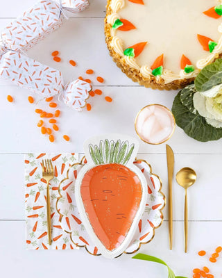 A table setting with My Mind's Eye Scattered Carrots Plate and gold foil on it.