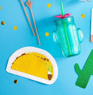 A Slant Taco table with Jumbo Shaped Napkins and a drink for a special day.