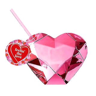 The Pink Disco Heart Tumbler by Packed Party is a heart-shaped, faceted cup that is BPA-free and comes with a straw and a tag that reads "feelin' the love," making it ideal for any party enthusiast eager to sip stylishly.