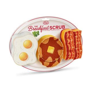 The Breakfast Scrub by Fred and Friends presents a collection of high-quality sponges designed to look like classic breakfast items, such as fried eggs, a buttered pancake, and strips of bacon, all charmingly arranged on a retro diner plate.