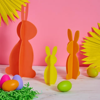 ACRYLIC BUNNIESBright and colorful acrylic bunny decor in shades of pink and lavender acrylic colors. Bunnies are perfect for your mantel or table. 
Sets include three acrylic bunnKailo Chic