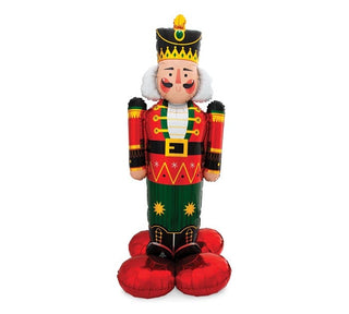 NUTCRACKER AIRLOONZ 61in BALLOON61" packaged Airloonz Christmas nutcracker shape balloon is red, green, and black with red base.These can be filled with air by the straw provided, nitrogen, electriBurton & Burton