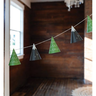 Tree Cone BannerBring the outdoors and adventure to your party with this mountain and tree banner. Made from cones that are 3.5 tall that feature illustrations of mountains and pineMy Mind’s Eye