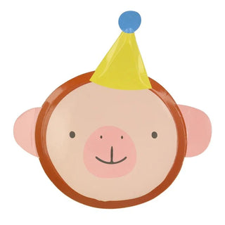A monkey with a party hat on an Animal Parade Die Cut Plate made from sustainable FSC paper by Meri Meri.