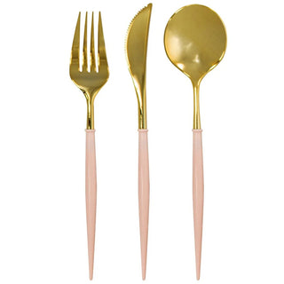 A set of Blush + Gold Bella Assorted plastic cutlery by Sophistiplate, featuring a fork, a knife, and a spoon, each with a sophisticated blush pink handle arranged neatly against a white.