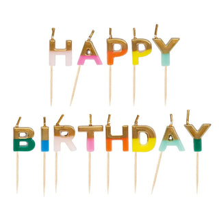 Birthday Brights Rainbow Happy Birthday CandlesThese adorable birthday candles spell out 'Happy Birthday' with rainbow letters dipped in gold. Perfect for any birthday cake, no matter the age.
 Each pack containsTalking Tables