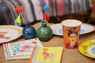 Frida Kahlo party supplies including Boho Llama & Pom Pom Food Picks decorations and Talking Tables cocktail sticks.