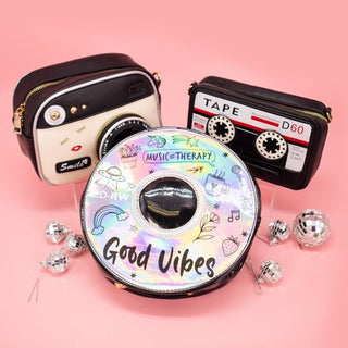 CD Mixtape Handbageelin' Nostalgic? Bring back the old times with this hip holographic CD handbag!
 Made with PU leather and comes with adjustable straps.Bewaltz