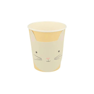 A cute, single-use Kitten Cup made from sustainable FSC paper, adorned with a simplistic cat face design, featuring pastel colors, and intended for children or cat enthusiasts by Meri Meri.