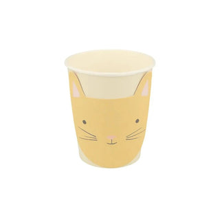 A cute, yellow sustainable FSC Kitten Cups with a cartoon cat face design from Meri Meri, featuring whiskers and ears, isolated on a white background.