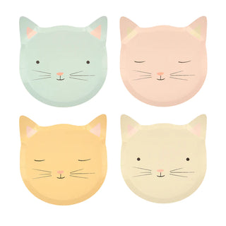 Four Meri Meri Kitten Plates with different on-trend pastels, showcasing simple and cute facial features with closed eyes and whiskers, arranged in a two-by-two grid pattern.