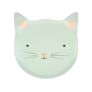 A whimsical, light green, cat-shaped plate with minimalist facial features; it features two triangular pink ears, dots for eyes, whiskers, and a cute nose. Made from sustainable FSC paper from Meri Meri's Kitten Plates.