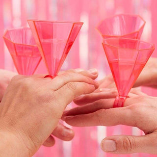 Dark Pink Acrylic Ring Shot GlassPOP the bubbly in celebration of your special day with these adorable ring glasses. Made out of acrylic and perfect for any bachelorette party or girls night.Slant