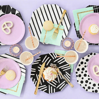 Dots Large PlatesThe artistic geometric designs on these large plates will turn heads on any table. The black-and-white palette lends a cosmopolitan vibe, and the plates are sturdy eCoterie Party Supplies