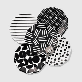 Dots Large PlatesThe artistic geometric designs on these large plates will turn heads on any table. The black-and-white palette lends a cosmopolitan vibe, and the plates are sturdy eCoterie Party Supplies
