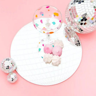 Disco Ball Acrylic Tray11” in diameter and 1/8” thick acrylic tray made from silver mirror acrylic. Use for cake, treats, or decor. 
Comes with rubber feet to protect your surface. Kailo Chic