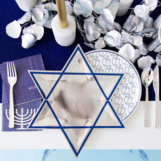Dreidel Dinner PlatesDreidel dinner plates are perfect for celebrating Hanukkah surrounded by family and friends. They are decorated with a silver foil rim and navy printed dreidels! 

PJollity & Co