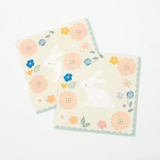 Two Meri Meri Easter Small Napkins featuring a bunny and flowers, perfect for Easter celebrations.