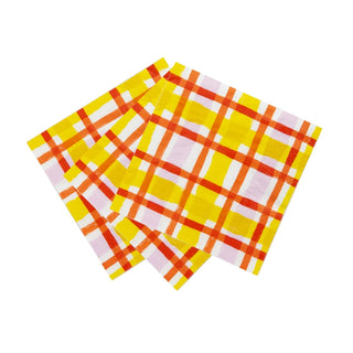 A set of Everyone's Welcome Yellow Napkins with orange gingham pattern by Talking Tables on a white surface.