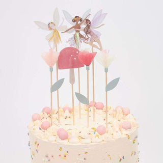 Fairy Cake ToppersTransform a celebratory cake, or cupcakes, into a fairy wonderland with these beautiful cake toppers. The set features 7 toppers in 7 designs, including fairies, a mMeri Meri
