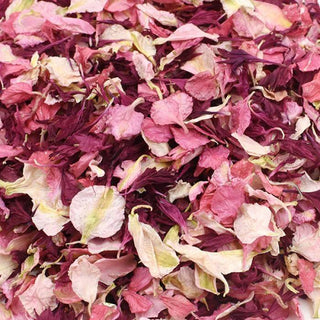 A pile of First Kiss Flower Confetti petals from Studio Pep, eco-friendly and biodegradable.