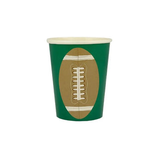 A green Meri Meri paper cup with Football Cups design, perfect for birthday parties.