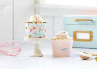 GOLD FOILED PASTEL BUTTERFLY BAKING CUPSOur brand new food cups are perfect for baking cupcakes right in the oven. But don't limit yourself, there are so many great uses for them: add candy and wrap in celMy Mind’s Eye