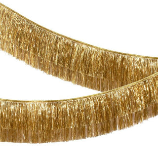 Gold Tinsel Fringe GarlandThis gorgeous gold tinsel garland is perfect to add style and shimmer in seconds. It'll look great at any party or celebration where you want a touch of sparkle.

2 Meri Meri