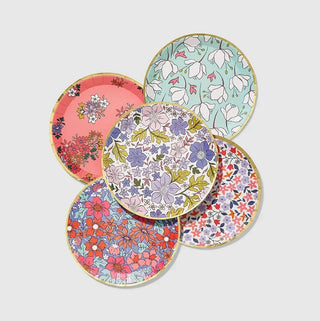 Full Bloom Small Paper Party PlatesGive your party a fresh from the garden feel with these small plates that are the perfect size for small bites and desserts. The contemporary floral print is accenteCoterie Party Supplies