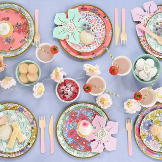 Full Bloom Small Paper Party PlatesGive your party a fresh from the garden feel with these small plates that are the perfect size for small bites and desserts. The contemporary floral print is accenteCoterie Party Supplies
