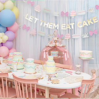 Let them eat Let Them Eat Cake Thingamajigs at the birthday party with festive party decorations by Daydream Society.