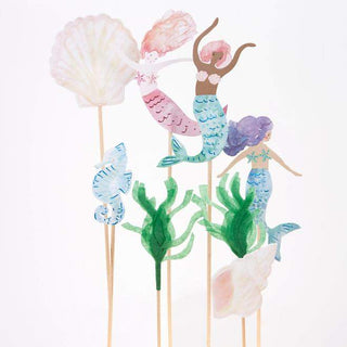 Mermaid Cake ToppersTurn a celebratory cake into something really special with these magnificent toppers. They feature beautifully illustrated mermaids, shells and a seahorse, and seaweMeri Meri