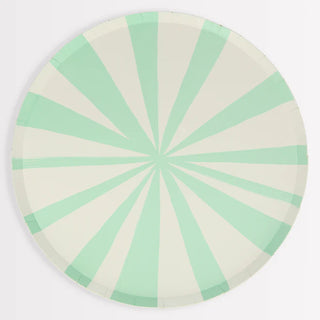 A mint and white stripe pattern on a round tray made of sustainable FSC paper, creating a stylish effect with Meri Meri's Mint Stripe Dinner Plates.