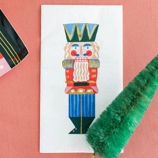 Nutcracker Guest NapkinsA sugar plum dream come true! Featuring a gorgeous color palette and shiny gold foil, these nutcracker napkins are ready to twirl their way into any holiday celebratDaydream Society